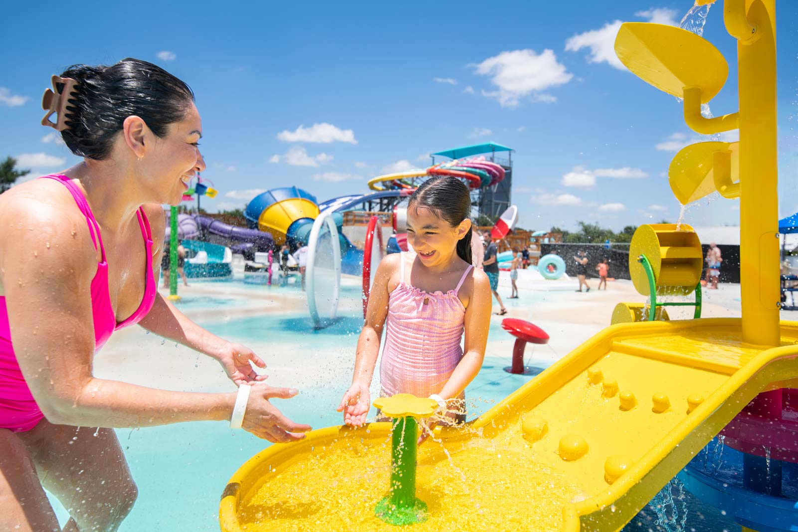 Family playing at Typhoon Jr. Splash Area